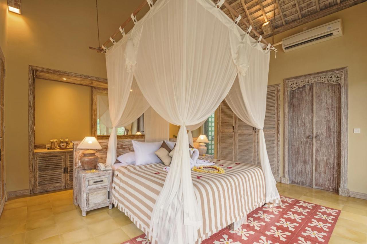 فندق وابا دي أومي سايدمين سيديمين المظهر الخارجي الصورة A bed with a mosquito net